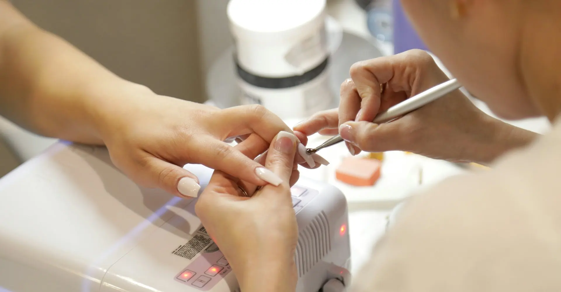 Nail technician giving a manicure